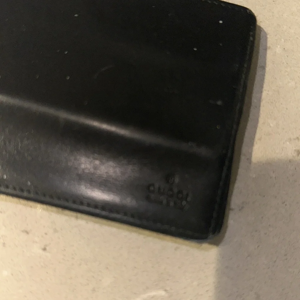 Authentic Gucci Sleek Black Wallet